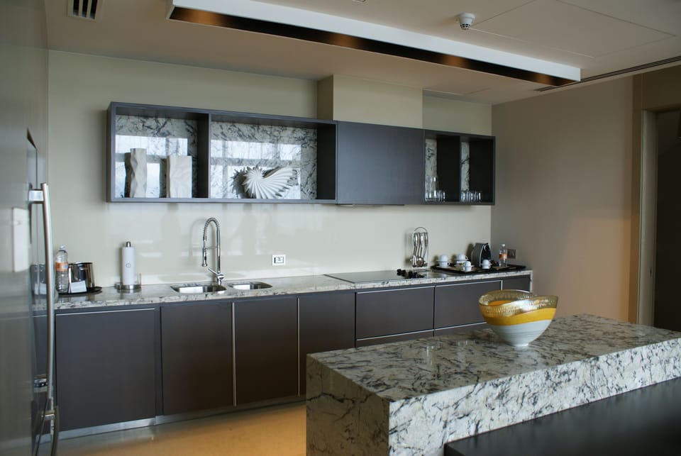 Full kitchen with dishwasher, stove, cook top, full size fridge and wine fridge.