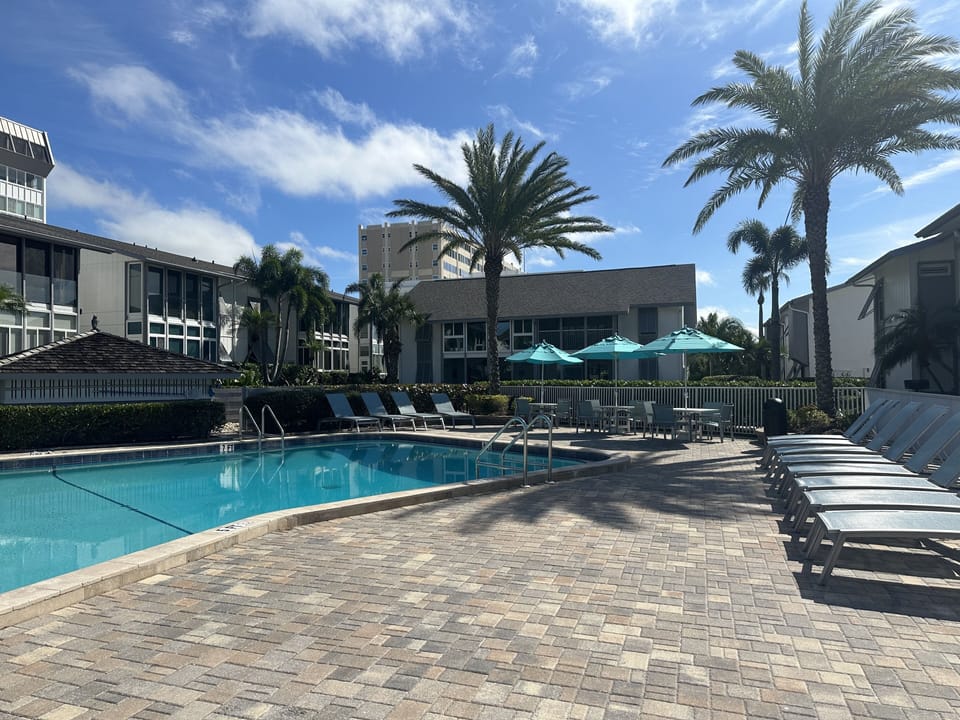 Swimming pool and grilling area adjacent to the beach