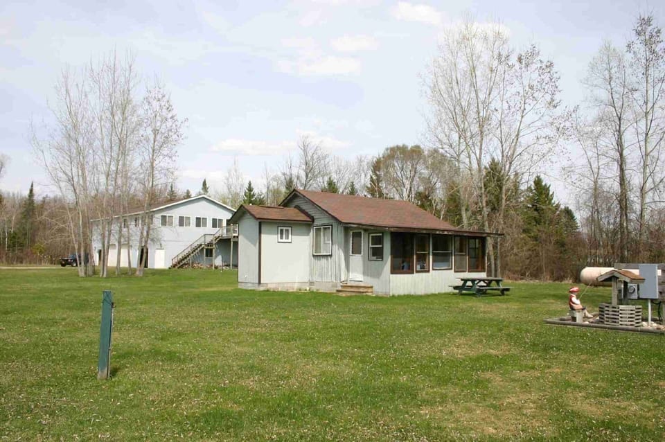 Cabin 5 outside view shows upper house in rear

