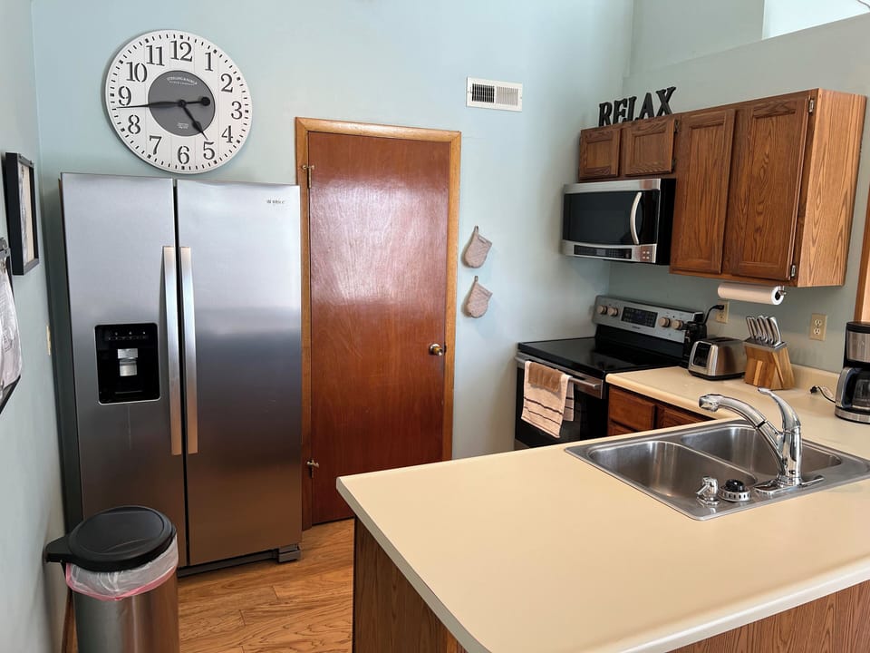 Full kitchen with updated appliances. Toaster and drip coffee maker