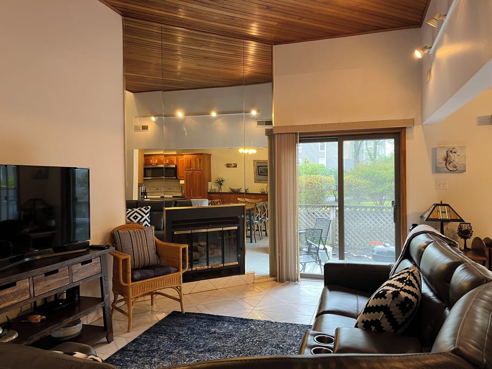 Relax in the living area on reclining leather sofa.