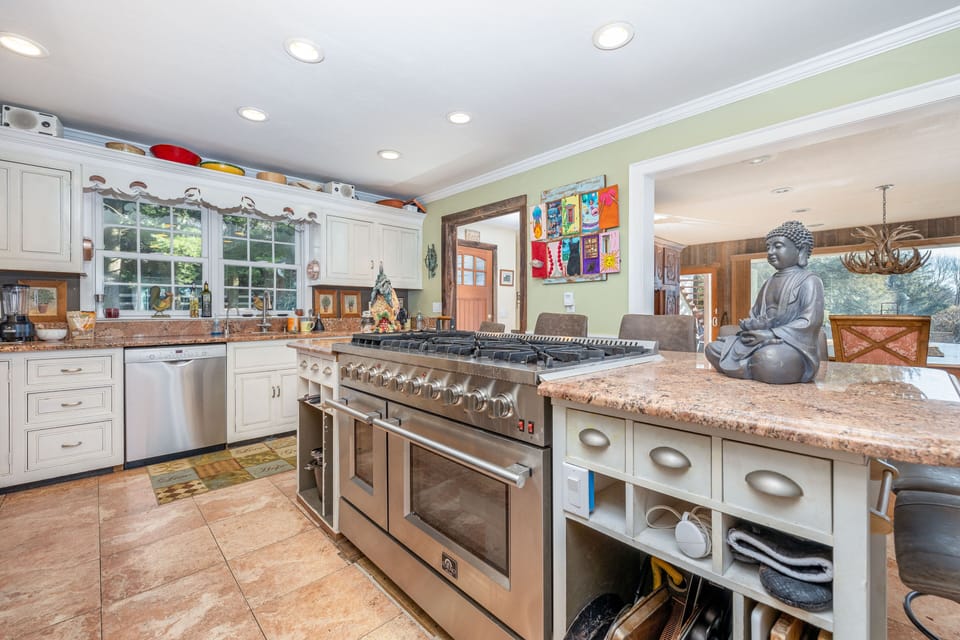 State-of-the-art kitchen and two outside grills as well with plenty of charcoal