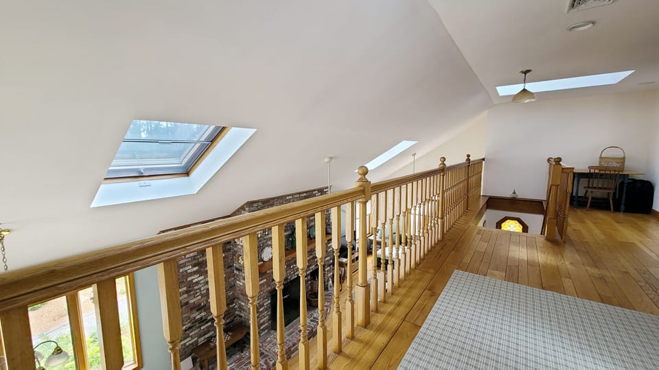 Second floor loft opens to main living area below