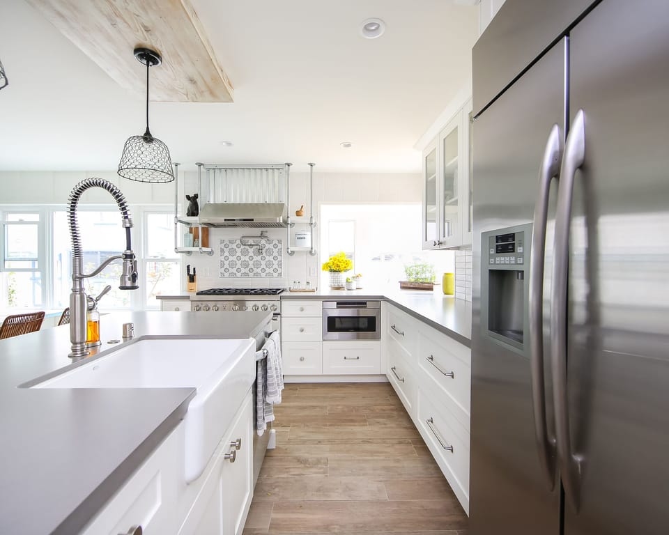 Luxury Kitchen with Barn Style Sink & Stainless Steel appliances throughout