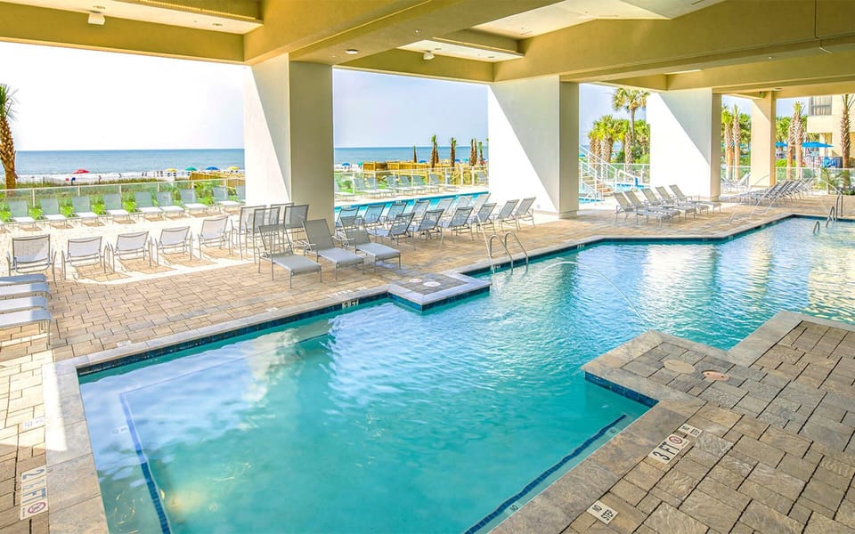 main pool, overlooking the beach. The bar is behind you.