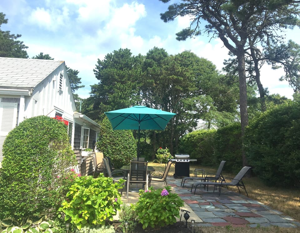 Relax in lounge chairs on shaded patio, gas grill for delicious outdoor dining!