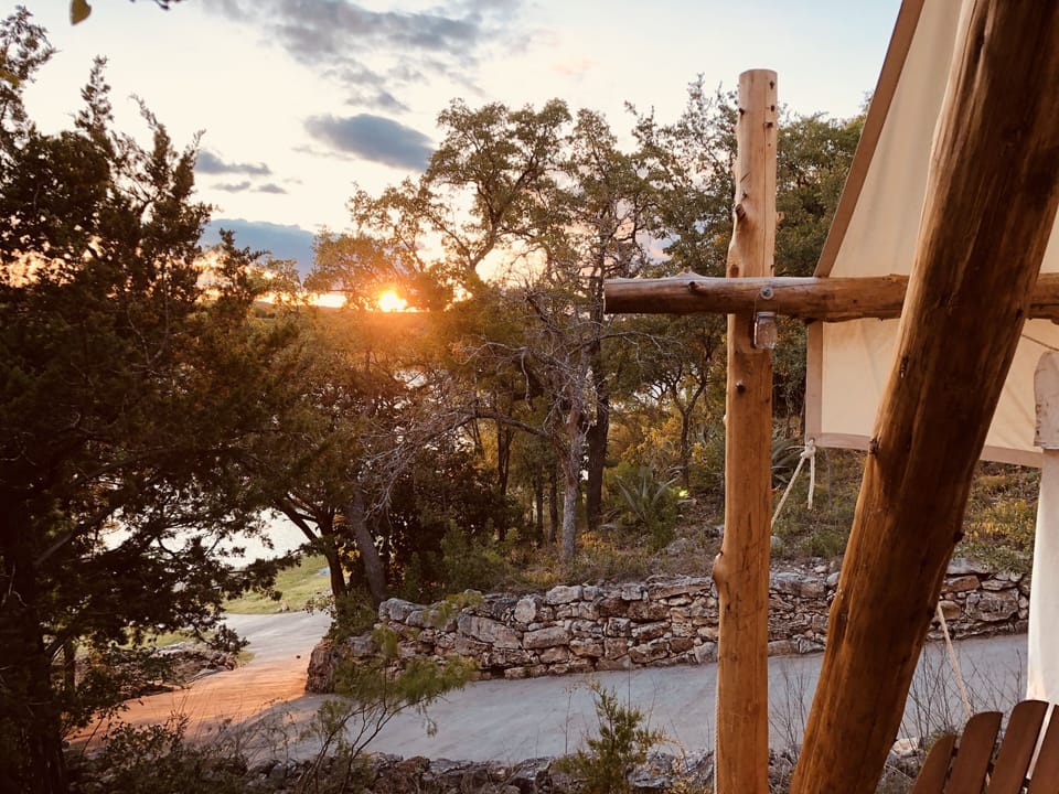Gorgeous sunsets over the lake are seen on the deck of the Safari tent!