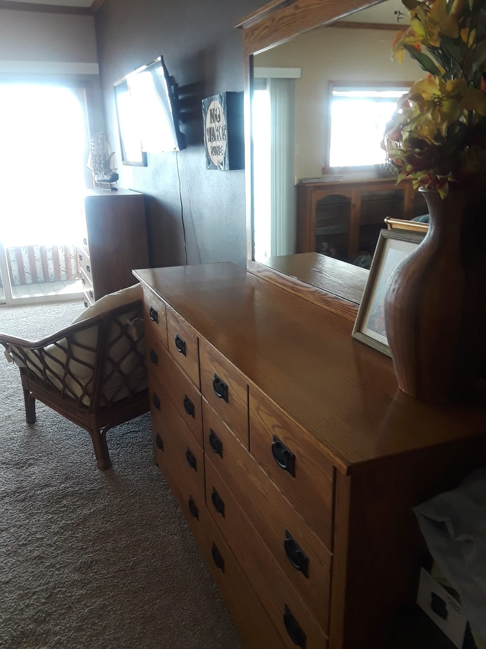 king bedroom with sliding doors to screened in porch