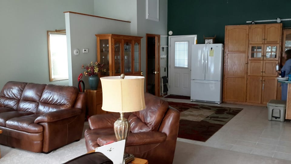 Living area and part of kitchen area.