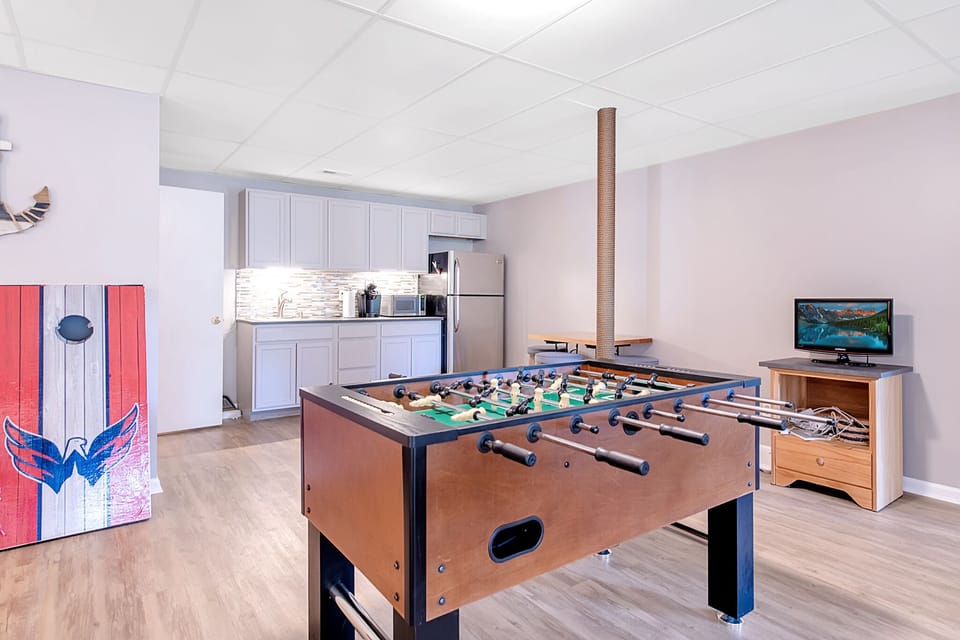 Foosball table, kitchenette with refrig in basement. Awesome basement!