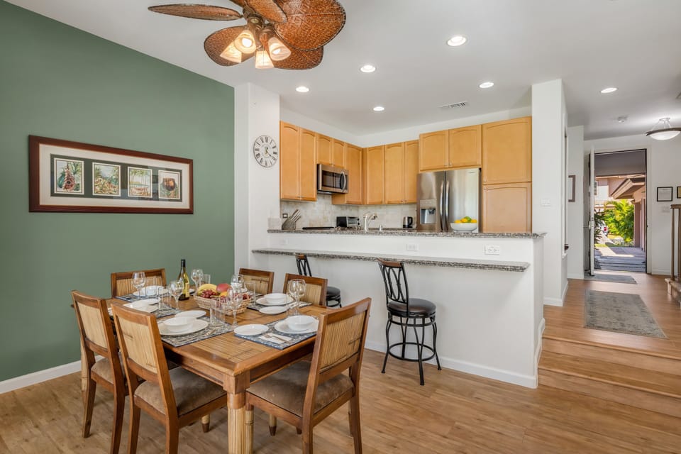Stylish dining space designed for relaxed meals and entertaining, surrounded by coastal hues and natural textures.