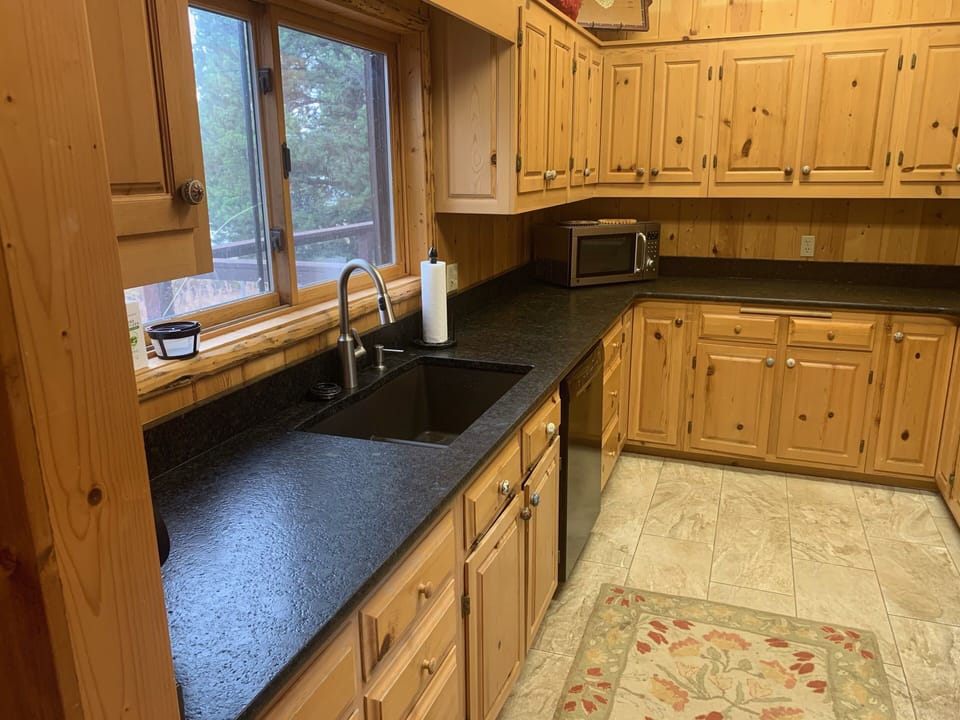 Sleek, new faucet and kitchen countertops 
