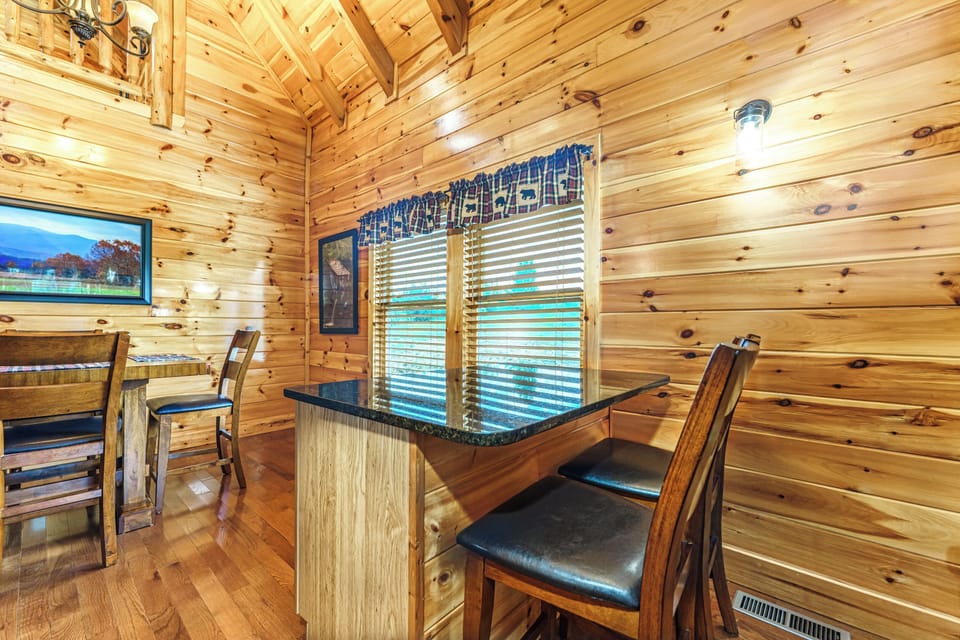 Enjoy extra seating at the kitchen island, offering space for two more guests to relax, snack, or chat while meals are prepared