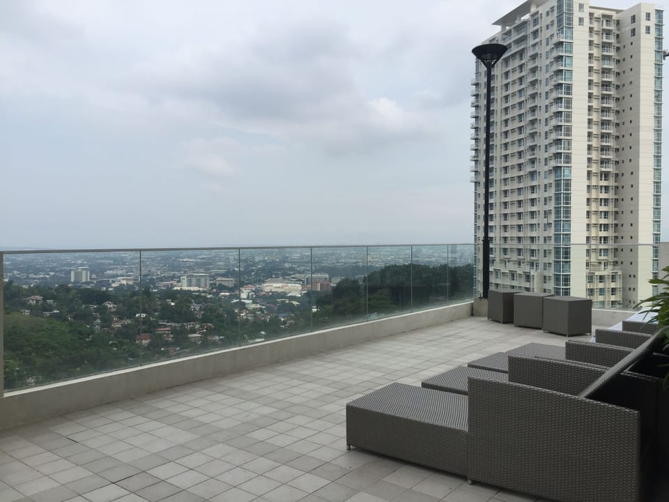 Lounge area by the pool overlooking cebu