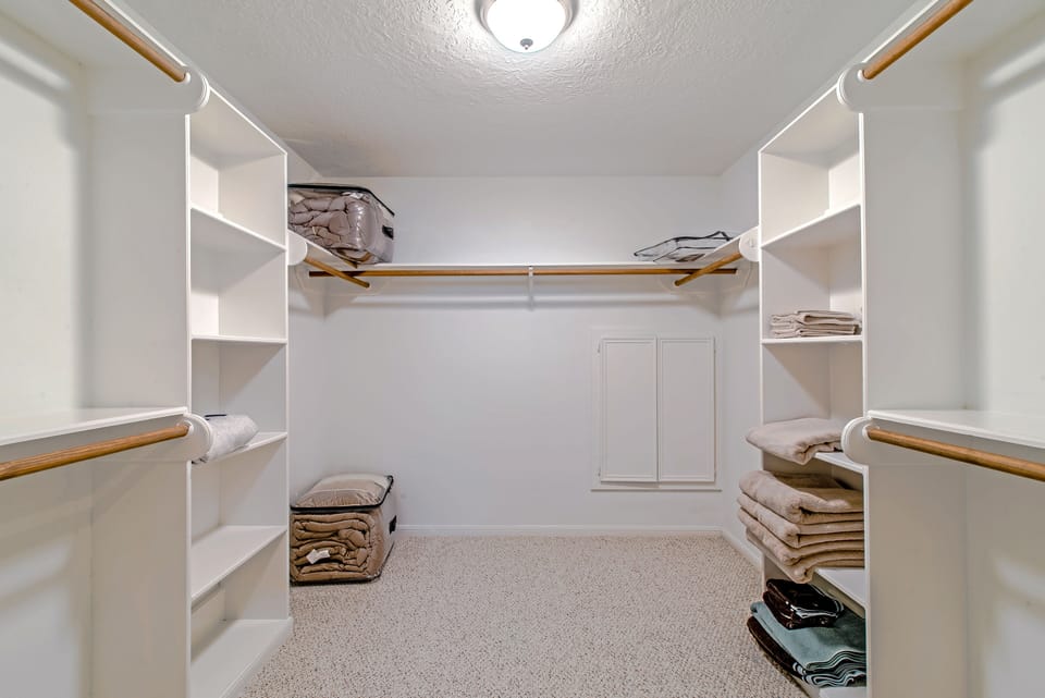 oversized master closet with built in storage