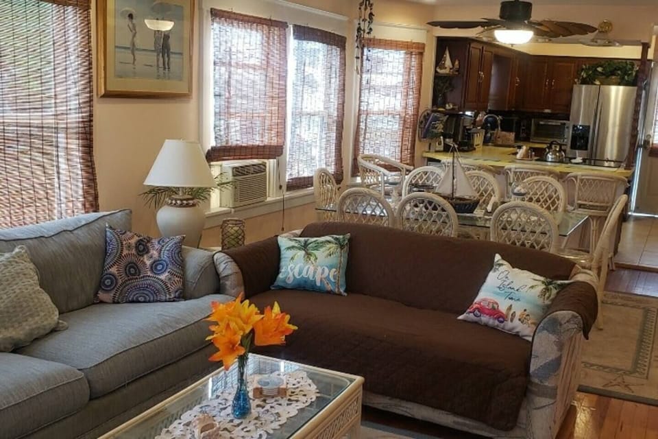 Spacious, Open Floor Plan. Couch opens to a full sofa bed. Perfect for game time with family or movie nights! 