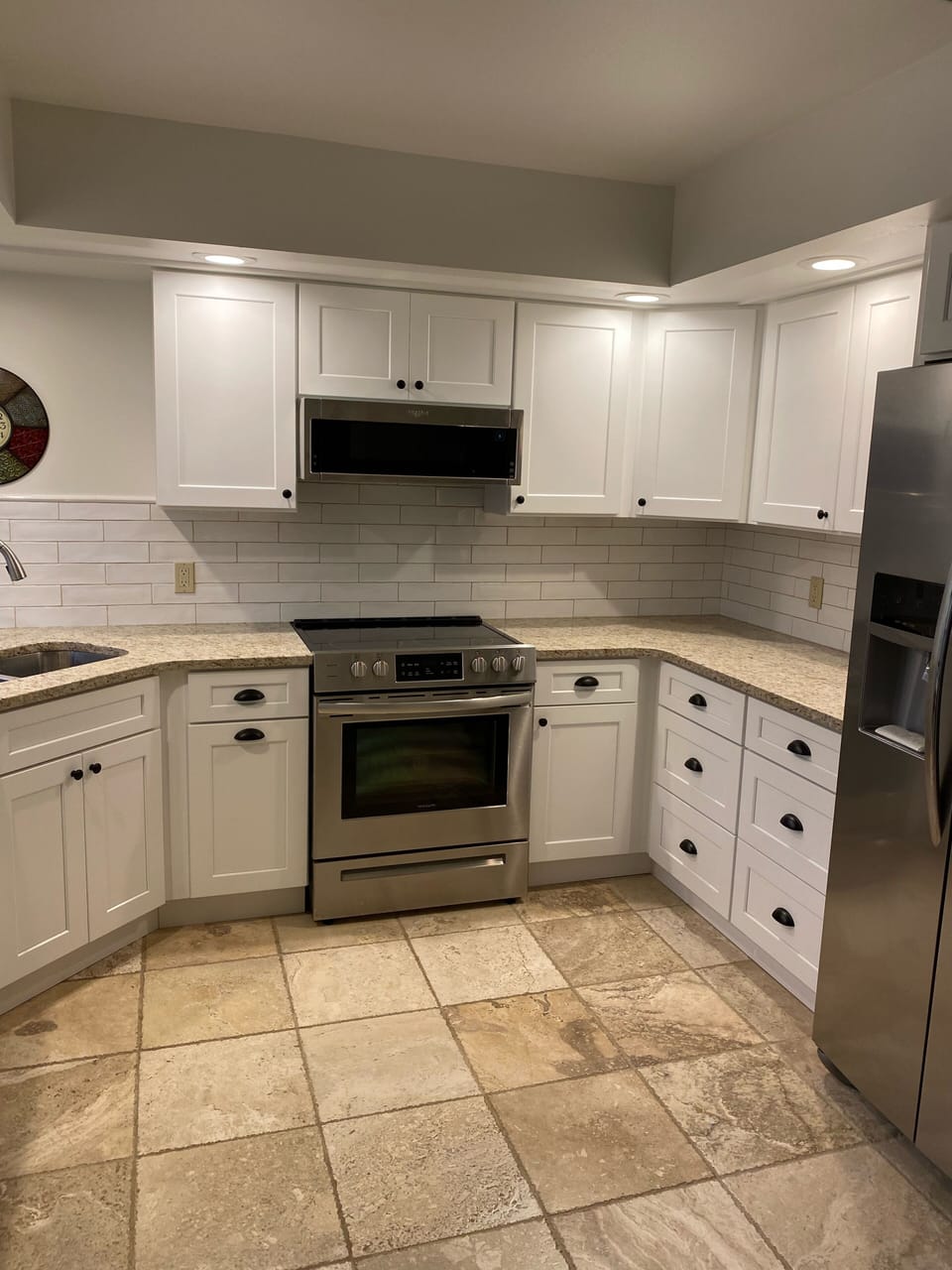 Large refrigerator & well equipped kitchen 
