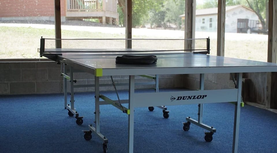 Screened in Porch with Ping Pong Table