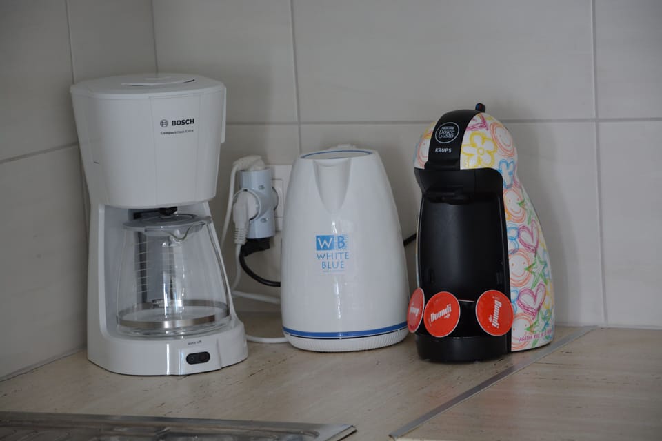 Nespresso coffee machine, filter coffee and ketle for hot water