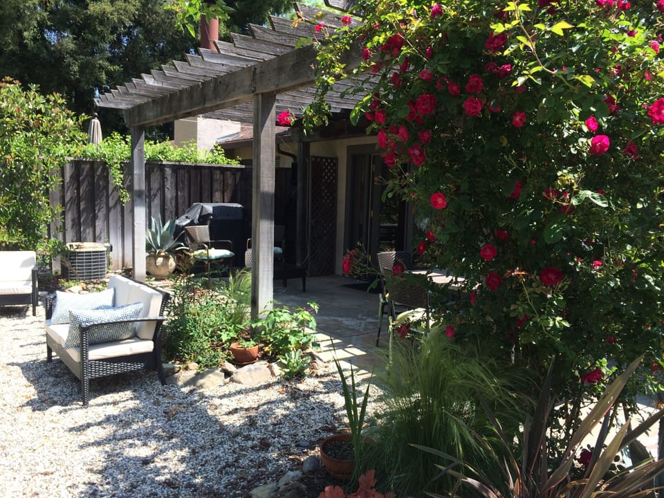 Stunning and spacious back patio adds lots of extra room and privacy . 
