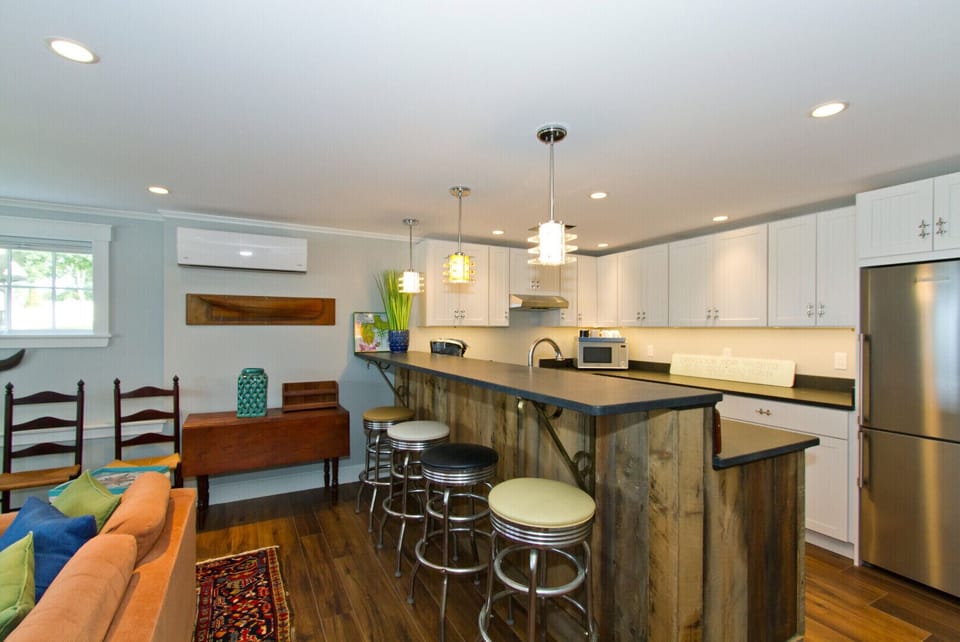 Custom kitchen with bar seating.
