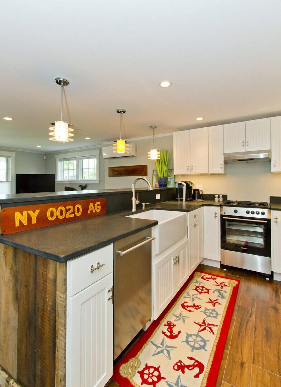 Granite countertops and stainless steel appliances.