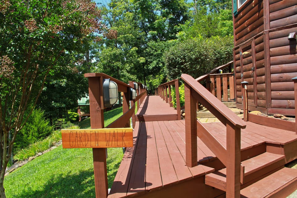 Boardwalk from the parking by the shared pool to the front door of Deer Lodge