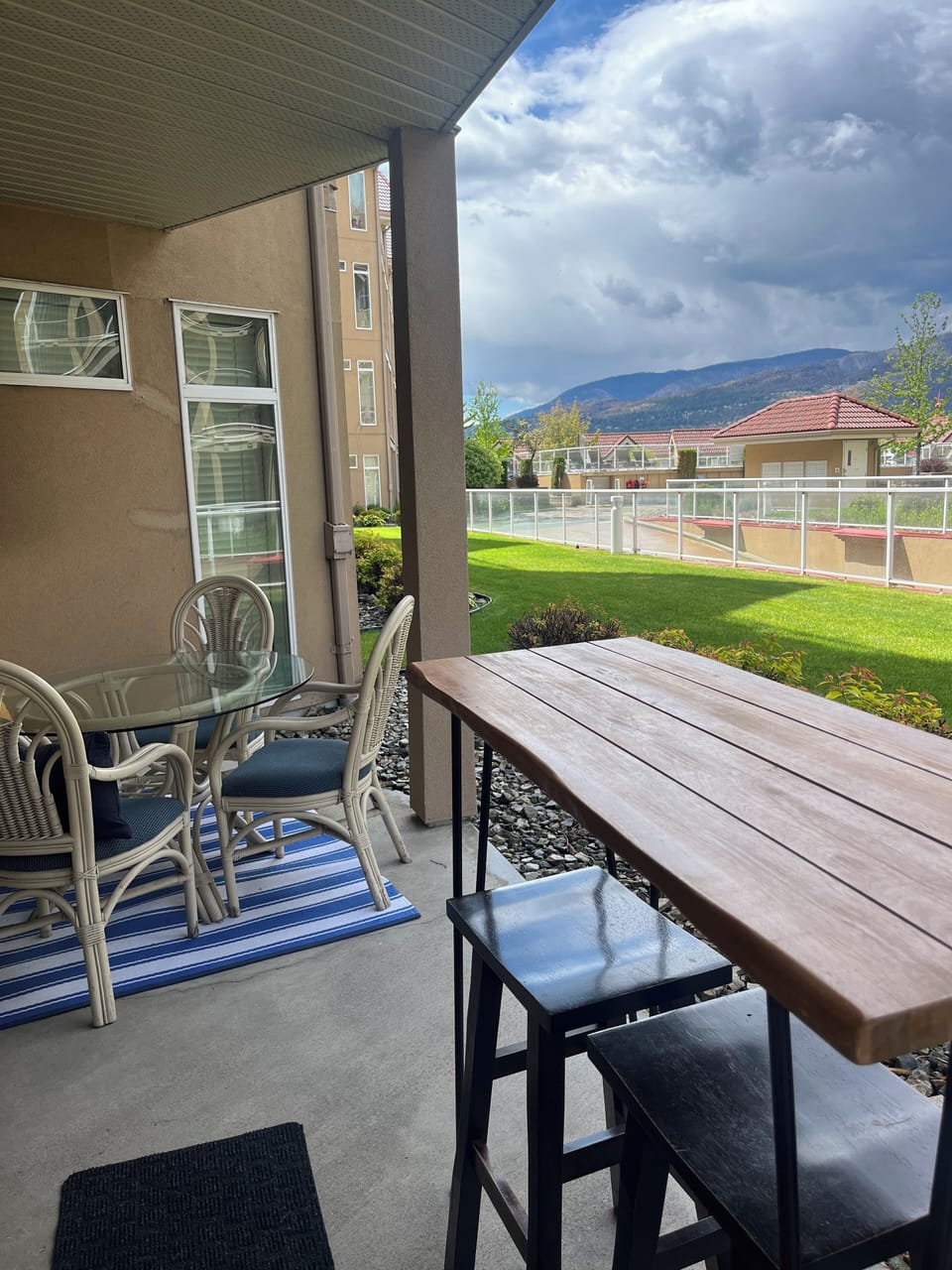 Patio with high top table and dining for 4. 