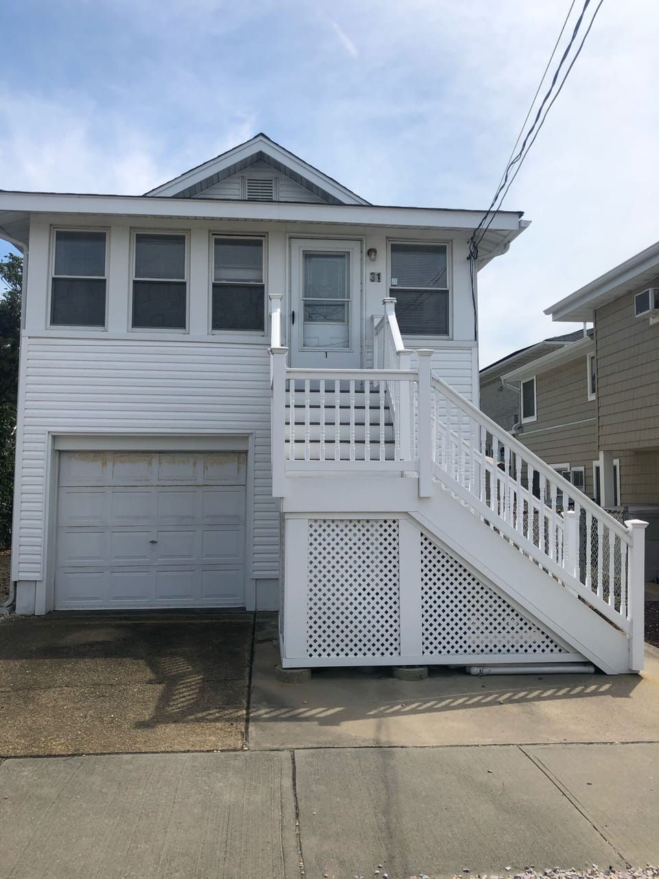 Beach block rental with driveway for your vacation convenience.