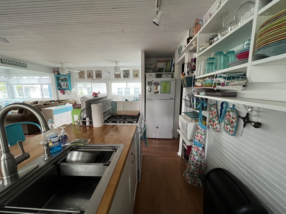 Large sink, full size Range, and full size Refrigerator