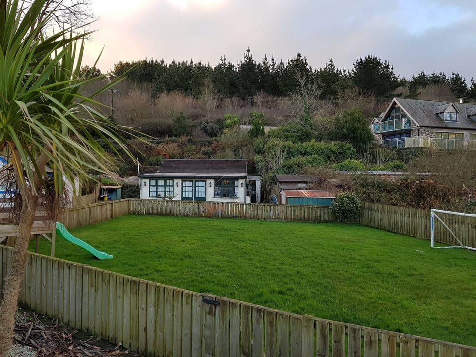 View from front deck across garden. There's a big house built on the left now