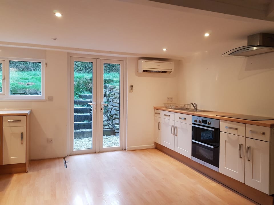 Kitchen Dining Area. (there is no rear garden now, just a small yard and wall)