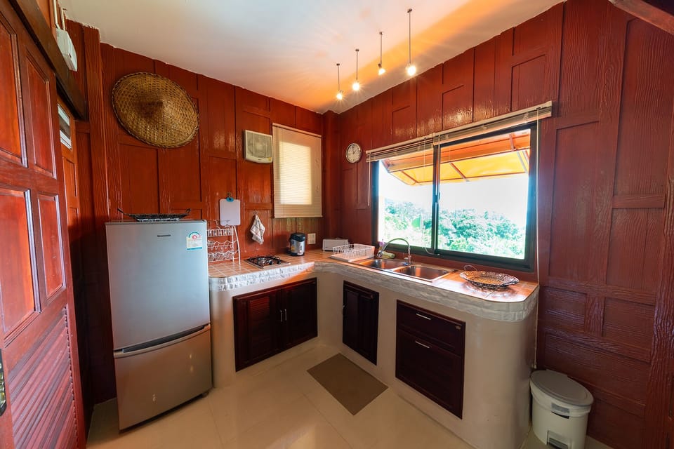 2nd floor's kitchenette, connecting to the living area and the two bedrooms
