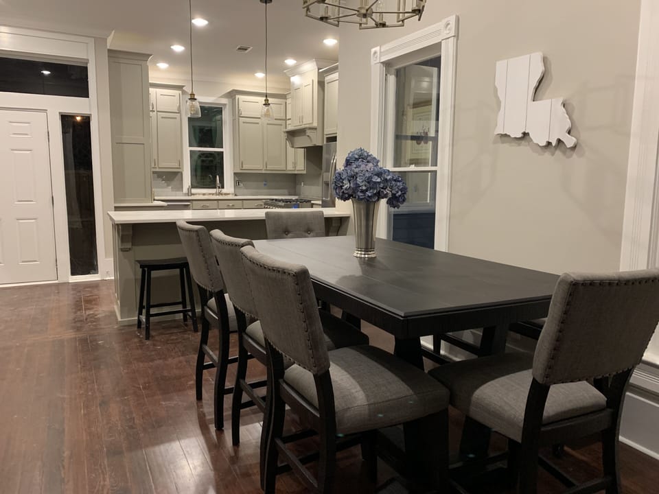 Dining area open to kitchen Seating: Love Seat, Dining seats 8 & Bar seats 3.