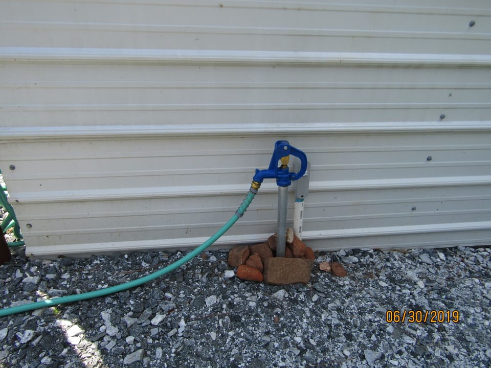 Water hose located at boat shelter for your use if needed. 