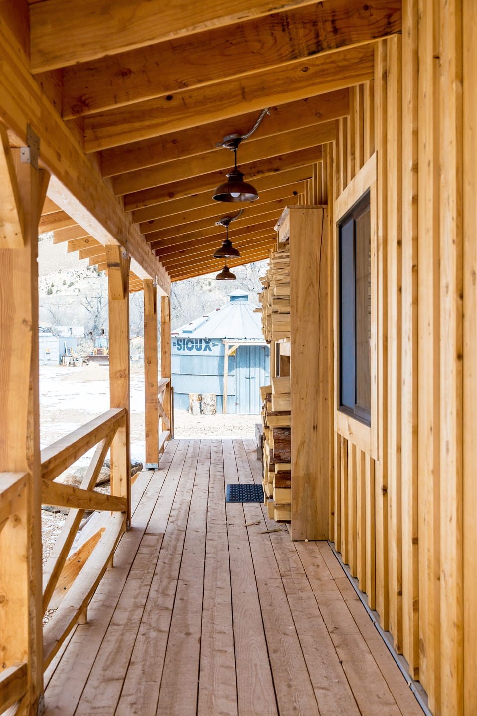 Front porch with wood silo in view
