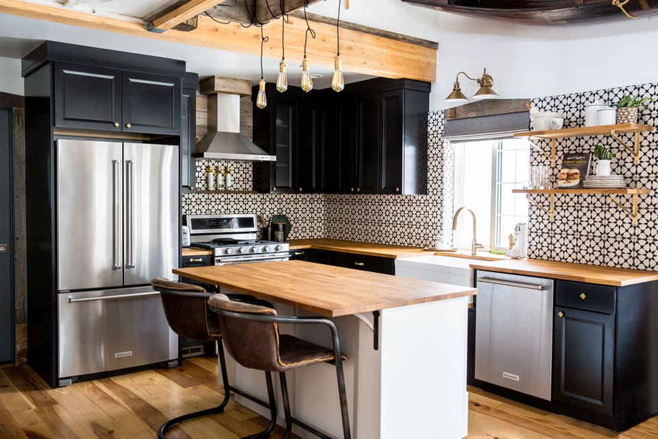 Kitchen area with window to back deck and river view