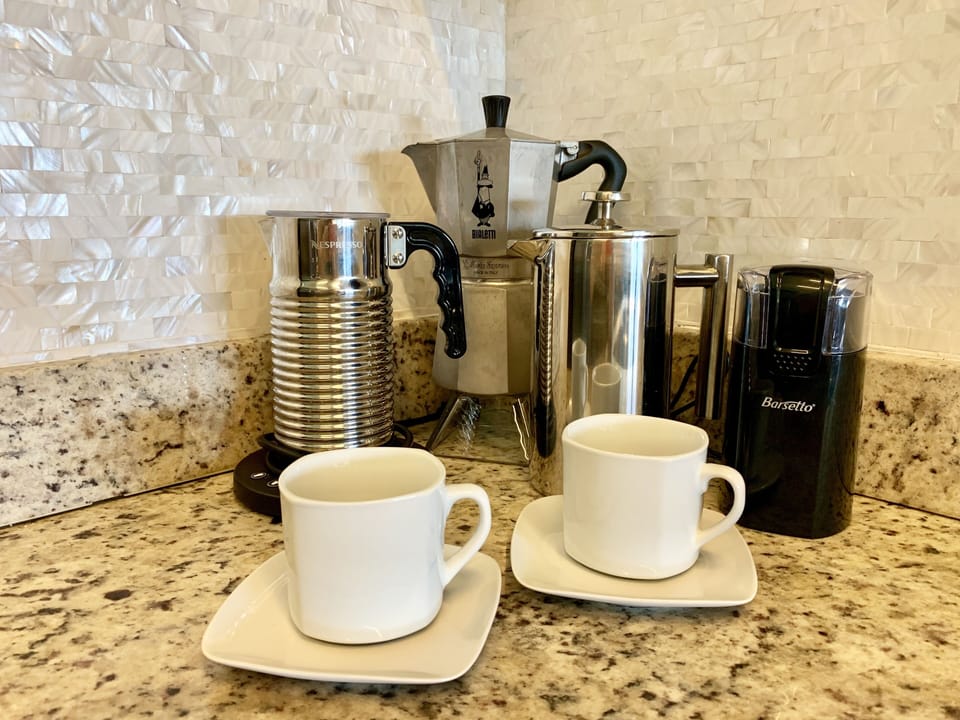 All the coffee accessories including drip coffee pot (not shown)
