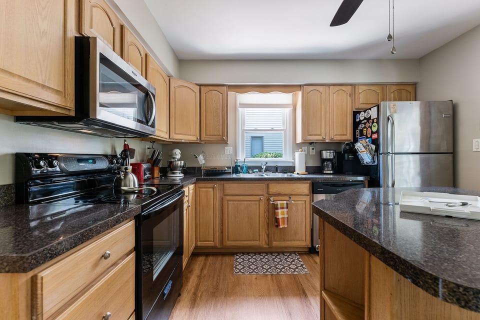 Filled with appliances and amenities, including a fully-stocked coffee and tea bar