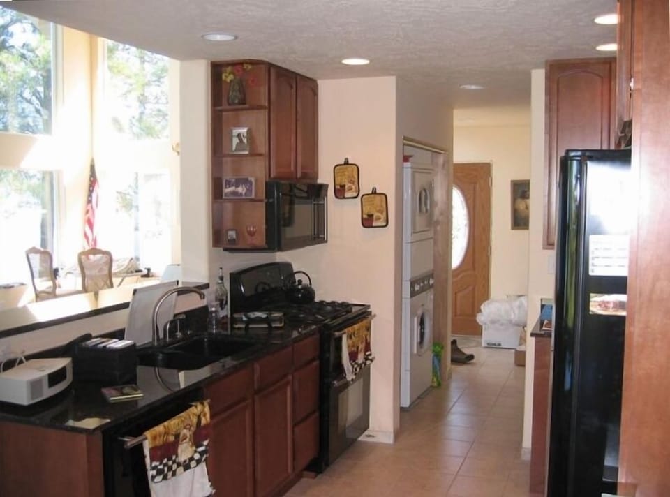 FULLY EQUIPPED KITCHEN WITH 5 BURNER GAS STOVE AND DOUBLE OVEN