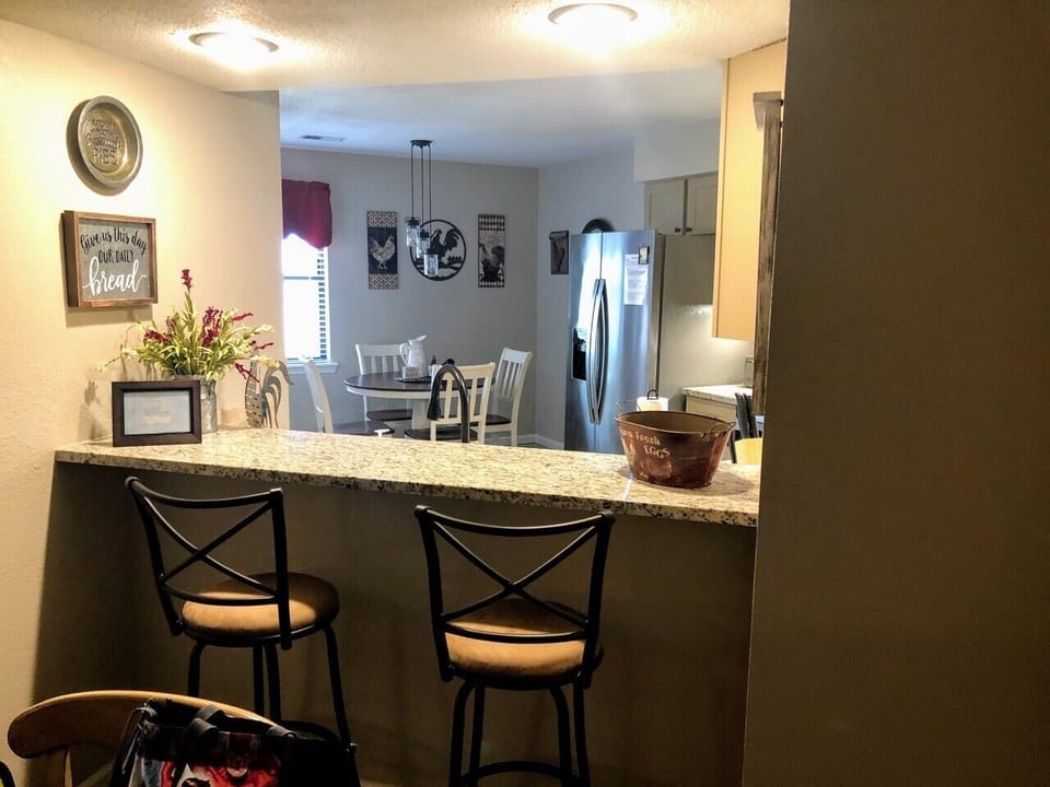 View of kitchen from bar