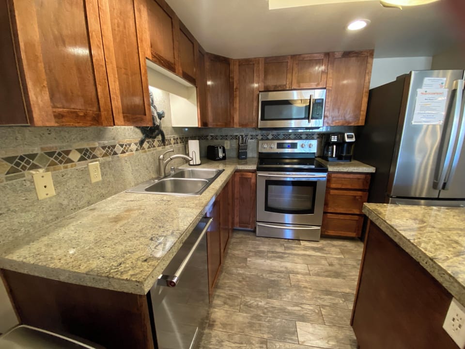 Fully stocked kitchen for preparing meals at the condo.