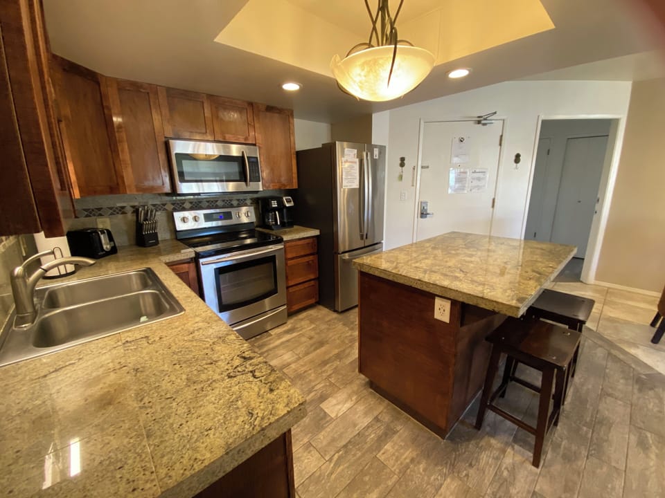 Fully stocked kitchen for preparing meals at the condo.