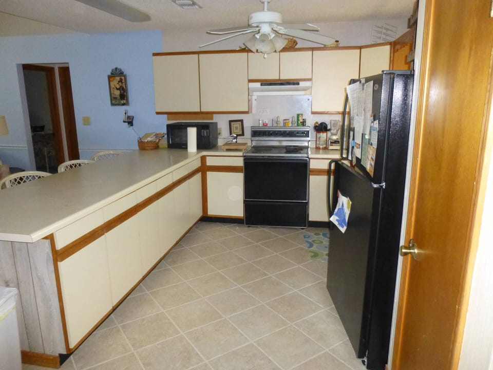 Kitchen is full size.  I was taking pictures of the tile-forgot to close fridge!