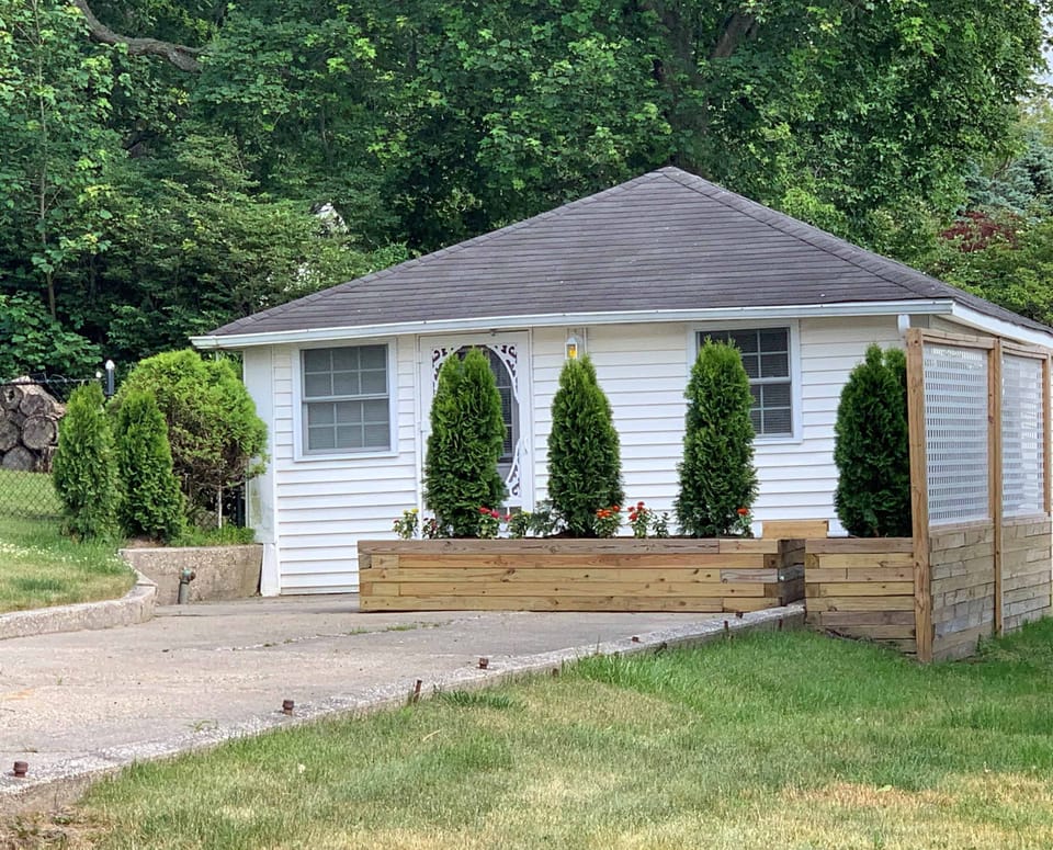 Seaside Stay cottage exterior with private porch