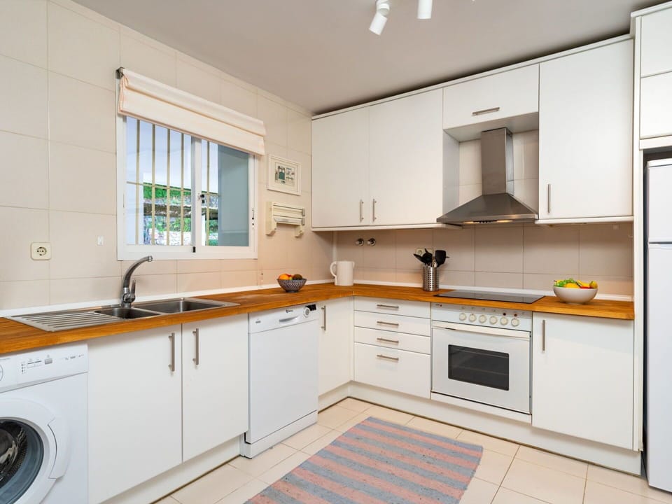 Property, Room, Kitchen, Cabinetry, Furniture, Countertop, Yellow, Interior Design, Building, Real Estate