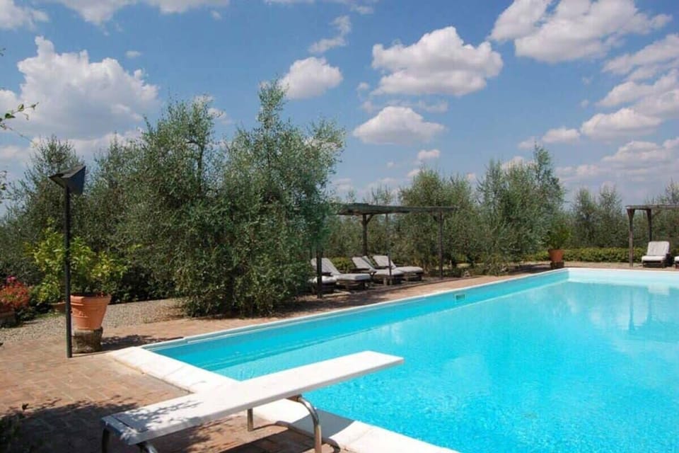 Spring board into swimming pool 
