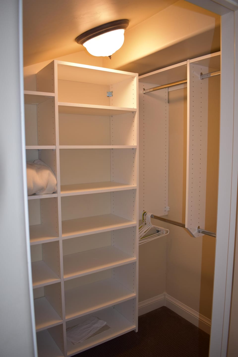 Queen bedroom walk in closet offers plenty of storage