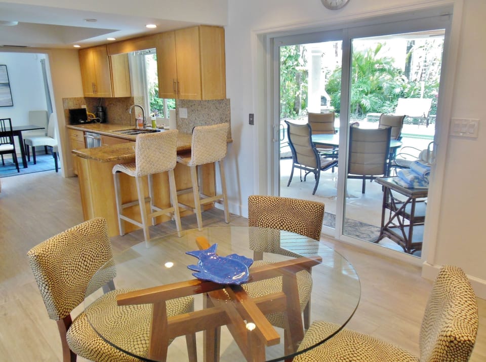 Dine Inside or Outside with the Kitchen Nearby to Make Dining Simple