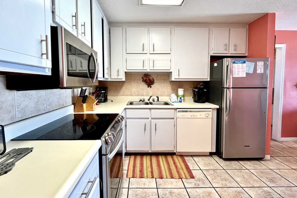Full kitchen with new refrigerator, stove, & microwave